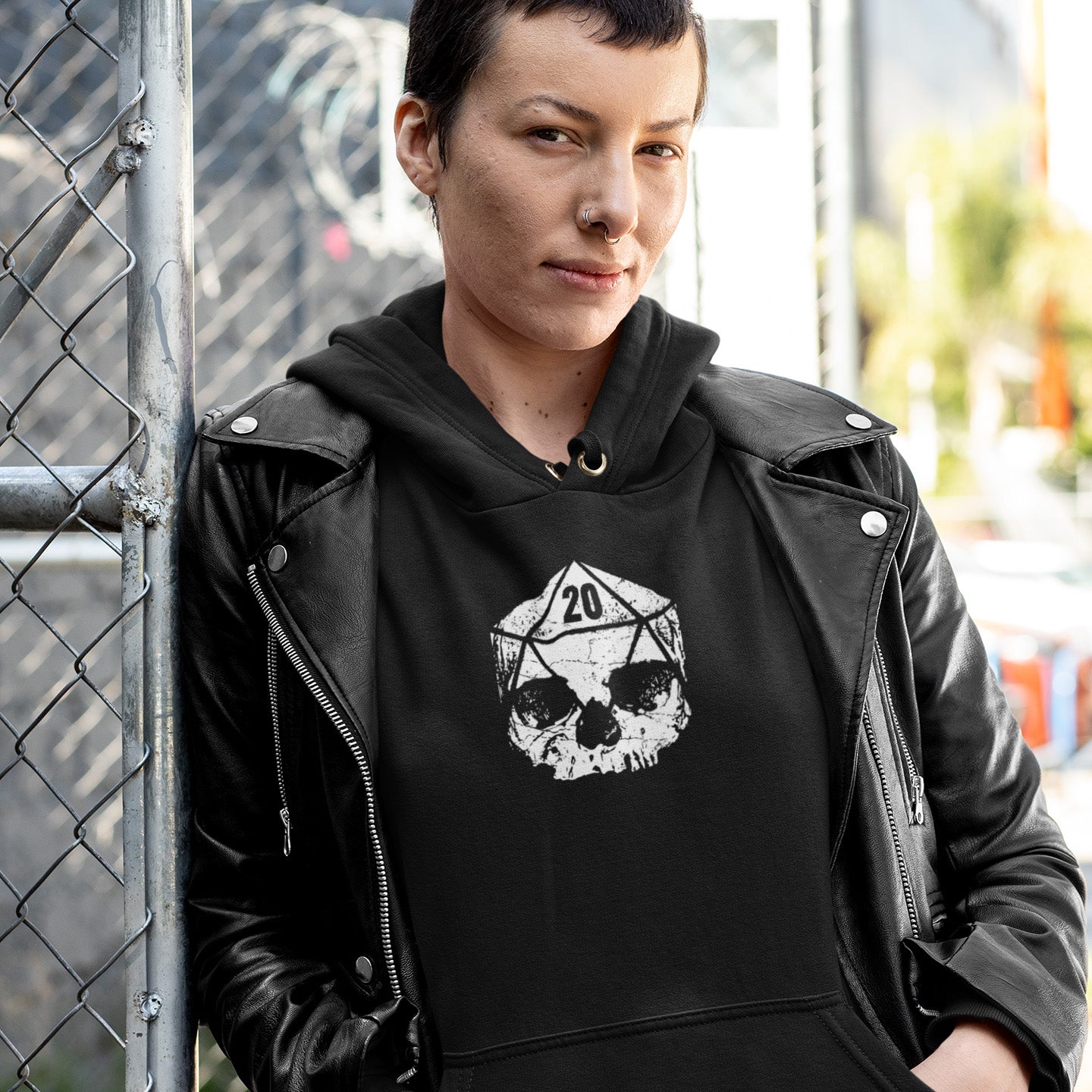 Woman Wearing Heavy Metal D20 Dice Skull Hoodie